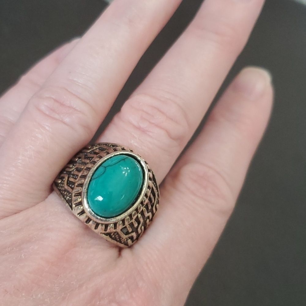Silver tone ring with blue size 10.25
